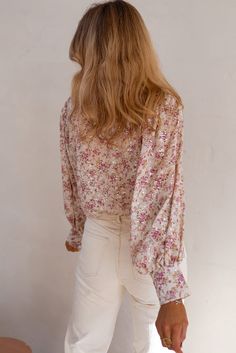 Experience the beauty and comfort of our Laney Floral Print Blouse. With its intricate floral design and soft, lightweight fabric, this blouse will keep you looking and feeling your best all day long. Upgrade your wardrobe with this elegant and versatile piece that is perfect for any occasion. Model Info: Models are 5'7", Size 2, wearing smalls Material: 100% polyester Size Chart (INCH) Sizes Bust Hem_Width Shoulder Sleeve_Length Length Relax Relax Relax Relax Relax S 40.2 42.9 16.3 23.2 24.4 M Feminine Long Sleeve Blouse With Ditsy Floral Print, Chic Flowy Blouse With Floral Print, Feminine Blouse With Ditsy Floral Print, Elegant Pink Viscose Blouse, Chic Ditsy Floral Print Long Sleeve Tops, Feminine Ditsy Floral Print Tops For Fall, Flowy Floral Print Blouse, Chic Long Sleeve Tops With Ditsy Floral Print, Feminine Tops With Ditsy Floral Print For Fall