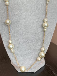 Vintage J Crew necklace. This is a single strand gold tone chain with faux pearls. Signed on the clasp. Gold Single Strand Chic Pearl Necklace, Classic Gold Pearl Necklace For Party, Chic Gold Single Strand Pearl Necklace, Gold Pearl Long Necklace For Formal Occasions, Pearl Necklaces With Gold Chain For Party, Party Pearl Necklace With Gold Chain, Pearl Necklace With Gold Chain For Party, Formal Pearl Necklace With Gold Chain, Vintage J Crew