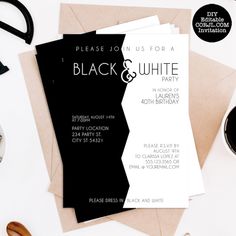 black and white party card with envelopes, coffee cup and other items on the table