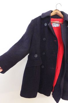 "Navy Wool Pea Coat Womens Size Large Peacoat Vintage 1960's Navy Coat with Anchor Buttons Styled by David of Boston for Jonathan Logan Vintage wool navy peacoat with red faux fur lining.  The tag says Styled by DAVIS of Boston A Division of Jonathan Logan.  There is a little wear and tear but overall, it's very good. There is some fading as you can see from the last pics.  It has many more years of service to give.  It's from the 1960's. If you need to return it, a restocking fee that covers the shipping and handling, it will be deducted from the total refund. I would say it's vintage size large, but please check measurements carefully.  Measured while laid flat: Chest: 21.5\" waist: 21\" hip: 23\"+ length from top of shoulder to bottom hem: 30\" length from top of shoulder to wrist hem: Styled By, Jonathan Logan, Navy Wool Coat, Navy Peacoat, Navy Pea Coat, Wool Pea Coat, Pea Coats Women, Navy Coat, Wool Peacoat