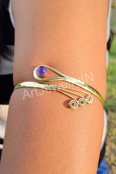 Solid Brass Arm Bangle, Amethyst Arm Band, Cuff arm Band, Upper Adjustable Bangle. Tribal Arm Bangle, Gemstone Arm Band, Arm Brass Bangle, Handmade item Materials: Brass Adjustable : yes Style: Bangles Gemstone: Amethyst  Bracelet Size Inches Circumference/Diameter 7 / 2.23 7.5 / 2.39 8 / 2.55 8.5 / 2.71 9 / 2.87 9.5 / 3 Elegant, , minimal and shiny ! A lovely basic to have in your wardrobe and wear anytime  O T H E R ∙ I N F O R M A T I O N * All items are nicely packaged ready to gift in elega Arm Bangles, Brass Bangle, The Bangles, Adjustable Bangle, Amethyst Bracelet, Elegant Jewelry, Bracelet Sizes, Arm Band, Solid Brass