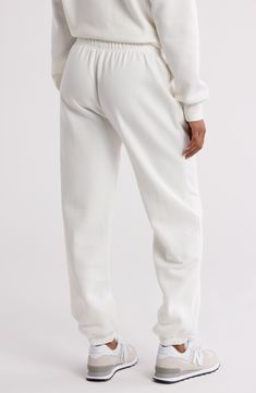 For everyday errands and warm weekends, these classic fleece sweatpants will keep you cozy. Elastic waistband On-seam pockets 68% cotton, 32% recycled polyester Machine wash, tumble dry Imported Young Adult Fashion, Concert Looks, Exclusive Clothing, Fleece Sweatpants, Ugg Classic, Designer Crossbody Bags, Sweaters And Leggings, Short Suit, Jogger Jeans