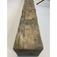 a piece of wood sitting on top of a table