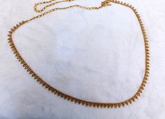 * Beautifully designed gold color belly chain. * can be used with belly dance costumes and saris. * Adjustable from 25 to 41 inches waist. * D.no.1 * D.no.2 *D.no.3 *D.no.4 Bohemian Gold Chain Belt With Adjustable Chain, Bohemian Gold Waist Chain For Festivals, Traditional Gold Bridal Belt With Tilla, Elegant Gold Chain Belt For Festival, Gold Ceremonial Bridal Belt, Elegant Gold Bridal Belt With Tilla Detailing, Festive Gold Bridal Belt With Tilla Detailing, Elegant Gold Bridal Belt With Tilla, Elegant Gold Bridal Belt For Ceremonial Occasion