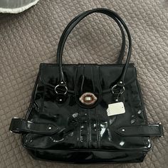 Nwt Franco Sarto Shoulder Bag With Patent Finish. Dimensions: H=11.5in L=15.5in D=4in Black Shoulder Bag With Hasp Closure For Everyday, Black Satchel With Hasp Closure, Black Satchel Bag With Hasp Closure, Black Handheld Satchel With Hasp Closure, Chic Black Satchel With Hasp Closure, Black Bags With Hasp Closure For Everyday Use, Black Satchel Tote With Hasp Closure, Black Shoulder Bag With Double Handle And Hasp Closure, Black Tote Bag With Hasp Closure