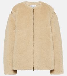 Chic Mohair Outerwear For Winter, Chic Mohair Winter Outerwear, Cream Merino Wool Outerwear For Work, Merino Wool Cream Outerwear For Work, Beige Mohair Long Sleeve Outerwear, Beige Mohair Outerwear For Fall, Luxury Merino Wool Outerwear For Fall, Cozy Cream Merino Wool Outerwear, Soft Mohair Outerwear For Fall