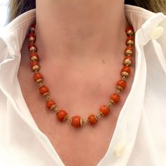 A classic antique coral bead station necklace circa 1900. The coral beads haver a deep red hue, near round shape, measuring 10-12 millimeter. The coral is natural untreated with no indication of dye. The gross weight is 17.5 grams. It measures 19” long. Big Coral Beads Necklace, Indian Coral Jewellery Gold, Coral Gold Necklace, Coral Gold Jewellery, Coral Beads Jewellery Indian, Gold Beads Necklace Indian, Coral Necklace Indian Gold, Coral Necklace Designs, Coral Jewelry Indian Gold