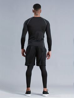 Introducing the 3Piece FastDrying Sport Suit for Men, perfect for casual wear and fitness activities. Crafted from high-quality polyester material, this suit offers comfort, style, and performance all in one. Benefits: Stay dry and comfortable during intense workouts with the fast-drying fabric Enjoy a full range of motion with the high-stretch material Keep your essentials close at hand with the convenient pockets Look sharp and stylish in the solid color design Experience breathable comfort during any season Whether you're hitting the gym, going for a run, or just lounging around, this sport suit is a must-have addition to your wardrobe. Upgrade your activewear collection with the 3Piece FastDrying Sport Suit for Men.Material:PolyesterBelt:YesSleeve Length:Long SleeveDetails:PocketPatter Black Moisture-wicking Long Sleeve Tracksuit, Black Long Sleeve Moisture-wicking Tracksuit, Sporty Moisture-wicking Compression Sets, Athleisure Long Sleeve Moisture-wicking Sets, Moisture-wicking Long Sleeve Athleisure Sets, Black Sportswear Tracksuit For Sports, Compression Sportswear Sets For Sports, Moisture-wicking Fitted Long Sleeve Set, Moisture-wicking Long Sleeve Gym Sets