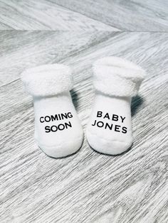 These adorable socks make the perfect baby announcement gift! **Listing is for 1 pair of socks** **Socks do not come pre stuffed** **Font size on socks may very depending on length of name** *Available Sizes:* 0-6 Month, 6-18 Month, 18-36 Month  Want a different saying? Just message for a custom order. ~Care Instructions~ Machine wash in cold water with alike colors, do not bleach, hang to dry or tumble dry on low heat. Personalized White Socks Gift, Cute White Booties For Gift, Cute White Booties As A Gift, Cute White Booties As Gift, Baby Coming Soon, Baby Christmas Gift, Baby Christmas, Baby Coming, Welcome Baby