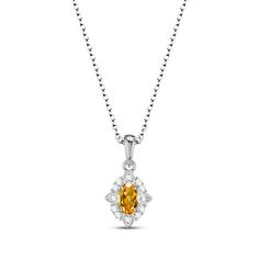 This delightful gift set includes a matching necklace, ring and pair of earrings crafted in classic sterling silver. Each piece showcases a sunny oval-cut citrine enveloped by a scalloped frame of dazzling round white lab-created sapphires. The set is boxed and ready to gift for any occasion. The earrings secure with friction backs and the pendant hangs from an 18-inch cable chain that secures with a lobster clasp. The ring comes available in standard size 7 only. Classic White Gold Citrine Jewelry, Elegant Oval Citrine Pendant Jewelry, Elegant Citrine Oval Pendant Jewelry, Elegant Oval Topaz Necklace, Elegant Oval Citrine Necklaces, Oval Citrine Necklace For Formal Occasions, Oval Topaz Necklace For Formal Occasions, Formal Citrine Necklace With Oval Shape, Elegant Yellow Marquise Jewelry