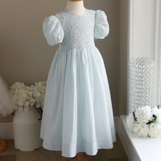 This Strasburg Dress Is Amazing!! The Dress Is Done In A Cotton And Linen -100% Natural Fibers For Comfort! The Pale Aqua Blue Was A Rare Special Edition Color. Rarely Did Strasburg Produce Fine Linen Dresses, Mostly Produced Fine Cotton Lawn Dresses. The Smocking On The Bodice Has A Beautiful Lattice Design With Embroidered Pale Pink French Bullion Rosebuds With Light Sage Greenery. A Scalloped Embroidered Border Joins The Bodice And Skirt. A Special Feature Of This Piece Is That The Embroidery Lawn Dresses, Baby Blue Dresses, Pale Aqua, Lawn Dress, Pink French, Embroidered Border, Lattice Design, Royal Baby, Smocked Dress