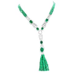 An exquisite necklace in Art Deco design, so refined, particular, a very adorable style. Necklace come in 18K gold with emeralds beads , and 40 pieces of Natural Zambian Emeralds, extra fine quality, spectacular color , in perfect cabochon oval cut , of 40,50 carats, and 774 pieces of natural diamonds in round brilliant cut , of 5,50 carats, F color VS clarity, very sparkly. Piece of high jewelry. Handcrafted by artisan goldsmith. Excellent manufacture and quality of stones . Complete with AIG report. Whosale price . Note : on my shipment, no taxes. Adorable Style, 18k Gold Necklace, Emerald Bead, Zambian Emerald, Multi Strand Necklace, Style Necklace, Art Deco Design, High Jewelry, Multi Strand