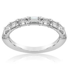 a white gold wedding band with baguetts