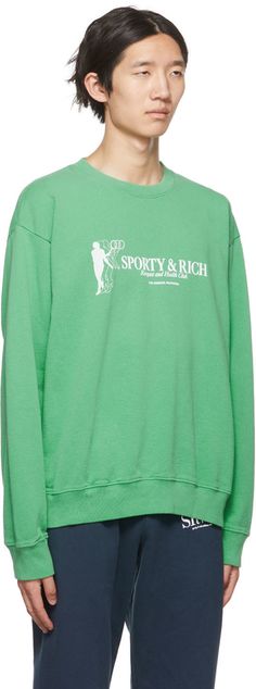 Cotton fleece sweatshirt. · Logo graphic printed at front · Rib knit crewneck, cuffs, and hem Supplier color: Kelly green/White Tennis Club Sweatshirt, Tennis Club, Club Sweatshirts, Sporty And Rich, Rich Green, Fleece Sweatshirt, Knit Crewneck, Mens Activewear, Cotton Fleece