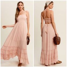 Blush Pink Jade Forever Yours Tiered Woven Bohemian Maxi Summer Dress - Feminine Woven Maxi Dress - Halter Strap Ribbon Tie On Neckline - Smocking On The Front Bust - 3 Bold Elastic Band Strap On Center Back For Easy Wear With Self Ribbon Tie On Waist Band - Ruching On Bottom Skirt - Tiered Layer On Bottom Skirt With Ribbon Detail - Finished With Clean Hem - Lining Inside - Model Is 5' 10.5" 32.5-24-37 And Wearing A Size Small Material: 100% Rayon Our Boutique Is Filled With A Curated Collection Feminine Boho Maxi Dress For Summer, Peach Bohemian Sleeveless Maxi Dress, Peach Sleeveless Bohemian Maxi Dress, Feminine Flowy Halter Neck Maxi Dress, Flowy Halter Neck Maxi Dress, Feminine Halter Neck Flowy Maxi Dress, Feminine Pink Boho Dress For Summer, Bohemian Peach Dress For Vacation, Bohemian Peach Dress With Ruffles