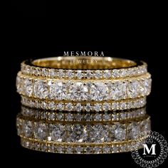 three rows of diamond rings with the words mesmora jewelry