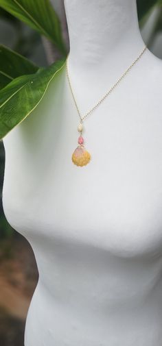 Sunrise Seashell with Pikake Flower Gold Necklace Materials: -Bright orange and pink Actual Shell shown -Pikake Flower -Cable Chain 14K Gold Filled -14K gold filled Lobster Claw Closure  Sunrise Seashell Hawaii Gift Seashell from Hawaii All Sales are Final  --- Packed ready for gift giving Flower Gold Necklace, Pikake Flower, Sea Shell Necklace, Hawaii Gift, Seashell Necklace, Orange And Pink, Shell Necklace, Shell Necklaces, Sea Shell