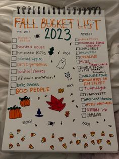 a planner with the words fall bucket list on it