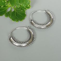 IMPORTANT **Please go through all the pictures i have posted for a listing with a ruler, on a model, on my hand, to get an exact idea of the actual size of the item. Tibetan style sterling silver chunky hoops. Dimensions: 22 x 25 mm Price is for ONE PAIR. These earrings are made of 925 hypoallergenic sterling silver. Most of my pieces come with a 925 stamp. Can be packaged in a gift box. I can include a personal message from you if needed You are welcome to contact me at... bhavnakwintra1956@gma Bohemian Small Hoop Sterling Silver Jewelry, Bohemian Oxidized Hoop Jewelry, Bohemian Small Hoop Silver Earrings, Silver Small Hoop Bohemian Earrings, Silver Bohemian Small Hoop Earrings, Bohemian Sterling Silver Pierced Hoop Earrings, Handmade Bohemian Sterling Silver Hoop Earrings, Bohemian Sterling Silver Nickel-free Hoop Earrings, Oxidized Sterling Silver Hoop Earrings For Festivals