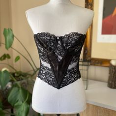 An Absolutely Breathtaking Vintage Corset Bustier Made By Christian Dior. This Corset Features Exquisite Black Lace With Floral Details, And A Large Satin V That Reaches The Bottom Of The Corset And Covers The Center Of Both Cups. The Tag Size Is A 36b, And The Bra Cups Have Wire Below Each. The Back Of The Bustier Has Two Rows Of Clasps. It Is In Great Shape For Its Age, Seemingly Only Worn A Few Times And Clearly Well Loved. No Visible Tears In Any Of The Delicate Lace. This Is A Stunning Piece Of Lingerie; Perfect For A Wedding Or Just Wearing Out On The Town! Dior Bustier, Aliyah Core, Core Outfits, Outfit References, Vintage Corset, Corset Bustier, Vintage Christian Dior, Fashion Icons, Bustiers