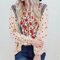 A Colorful Paisley Patterned Top With A Signature V-Neckline And Flowy Blouson Sleeves Is The Perfect New Go-To For Finishing Off Your Boho Style. V-Neck - Long Blouson Sleeves - Slips On Over Head - Paisley Floral Print - Twisted High/Low Hem - Woven Construction - Ivory Cream Colored- 100% Rayon Fall Boho Print V-neck Tops, Casual V-neck Boho Print Tops, Bohemian Floral Print Tops For Fall, Casual Long Sleeve Blouse With Boho Print, Casual Long Sleeve Boho Print Blouse, Casual V-neck Peasant Top For Fall, Fall Casual Peasant Top With Boho Print, Boho Print V-neck Top For Day Out, Casual Boho Print Peasant Top For Fall