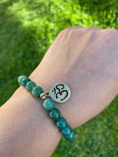 Jade Bracelet*Healing Jewelry*Gemstones Bracelet* Unisex Jewelry *Handmade Jewelry* Om Sign* Yoga Jewelry *Beaded Bracelet* 8 mm Jade Beads Brass Charm Jade -Prosperity -Well Being -Good Luck 🍀 Om Sign, Jewelry Beaded, Yoga Jewelry, Jade Bracelet, Brass Charms, Healing Jewelry, Unisex Jewelry, Jade Beads, Gemstone Bracelets