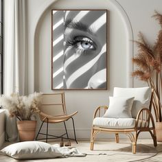 a living room scene with focus on the eye framed in wood and wicker furniture