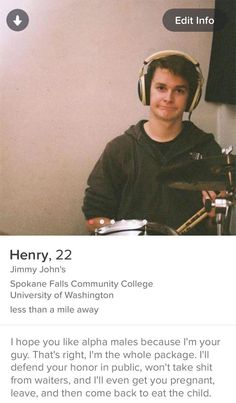 a man with headphones on sitting in front of a drum set