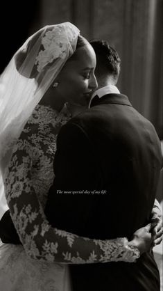 a black and white photo of a bride and groom