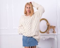 "MATERIAL : 3 strands of 100 % alpaca yarn COLOUR : Natural ( There may be a slight difference because of the different monitors' representation) ♥ In the picture the model is wearing a garment with these measurements : A: ( Body Length) : 28.7 \" / 73 cm B: (Chest width) : 22.8 \" / 58 cm C : (Sleeve from armpit) : 24.8 \" / 63 cm D: (Neck unrolled) : They are taken with the item laid flat and not streched. ♥ For choosing your size please look at size chart in our listing pictures. Please check Alpaca Chunky Knit Crew Neck Sweater, Alpaca Crew Neck Sweater In Chunky Knit, Alpaca Crew Neck Sweater With Chunky Knit, Handmade Beige Winter Sweater, Pink Sweaters, Red Jumper, Alpaca Sweater, Alpaca Yarn, Cable Sweater