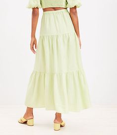 Flouncing and flowing in tiers, this linen midi skirt twirls getaway romance into any style routine. Elasticized waist.,Imported:Imported,Length:35 1/4" long,Fabrication:100% Linen,Garment Care:Machine Washable Loft Beach Tiered Linen Midi Skirt Size XL Lily Green Women's by Loft Size Regular - XL Lily Green Women's Beach, Cover-Ups, Swim, 100%, Linen, Machine, Washable Breezy Tiered Maxi Skirt, Breezy Tiered Ruffle Maxi Skirt, Breezy Ruffled Tiered Maxi Skirt, Breezy Tiered Maxi Skirt With Ruffles, Spring Breezy Gathered Maxi Skirt, Spring Breezy Flared Maxi Skirt, Breezy Flared Maxi Skirt For Spring, Voluminous Tiered Skirt For Vacation, Flowy Tiered Bottoms For Vacation