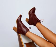 You'll be cozy and cute all day long in this pair of faux leather booties. They feature a lace-up vamp, an almond toe, and a stacked heel. Wear them with a sweater dress and hoop earrings for a perfectly Fall look.Fit & FeaturesLace-up vampAlmond toeStacked heelFits true to size Lace Up Block Heel, Fall Looks, Leather Booties, Womens Oxfords, Stacked Heel, Block Heels, Bootie Boots, Oxford Shoes, Almond