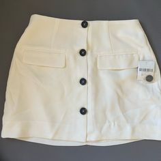 White Forever 21 Skirt Trendy Summer Workwear Mini Skirt, Summer Mini Skirt With Button Closure, White Mini Skirt With Button Closure For Summer, Summer Pencil Skirt With Button Closure, Summer White Skort For Workwear, White Summer Workwear Skort, White Skort For Summer Workwear, Chic Spring Mini Skirt With Button Closure, White Midi Skirt With Button Closure