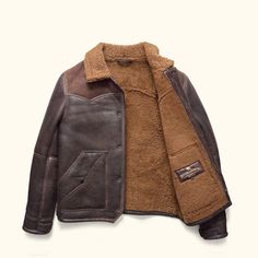 ***ESTIMATED RESTOCK DATE FOR OUT OF STOCK SIZES -January 13th, 2025** Step into the untamed spirit of the West with the Jackson Leather Shearling Jacket, where rugged elegance meets raw attitude. Designed for the modern cowboy, this jacket exudes confidence and adventure. Crafted from the finest full sheepskin wool from the world best tanneries in Turkey, this shearling leather features a striking two-tone brown leather yoke that adds a unique touch to its classic silhouette. YKK antique brass Leather Shearling Jacket, Waxed Canvas Jacket, Shearling Leather Jacket, Dark Brown Leather Jacket, Leather Jacket Brown, Modern Cowboy, Lambskin Leather Jacket, Leather Jacket Style, Leather Duffle Bag