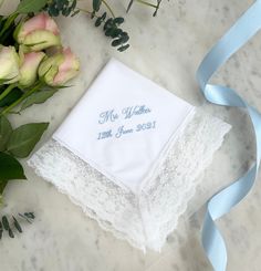 "Give a truly unique gift with our luxury lace wedding handkerchief. Made from the highest quality materials, each handkerchief can be custom embroidered with a date, monogram of the couple's initials or your own special message.  Each handkerchief comes gift wrapped in its own individual ribbon-tied box. For longer messages requiring more characters, please see our custom embroidered message handkerchiefs https://www.etsy.com/uk/listing/877263122/wedding-handkerchief-from-bride-message?ref=shop_home_active_10&frs=1&crt=1 * Embroidery colours pictured ;  \"Mrs Walker\" - Powder Blue \"LMS\" - Powder Blue \"Sophia&Daniel\" - Gold How to Order; - Select thread colour for embroidery. - Add the lettering for personalisation. If you would like a design proof before ordering, please contact us Elegant Wedding Handkerchief With Lace Work, Elegant Lace Wedding Handkerchief, Elegant Lace Work Handkerchiefs Gift, Elegant Lace Work Handkerchief For Wedding, Elegant Lace Work Wedding Handkerchief, Lace Wedding Handkerchiefs With Lace Trim, Lace Handkerchiefs With Lace Trim For Wedding, Wedding Handkerchiefs With Lace Work, Traditional Wedding Handkerchiefs With Embroidered Border