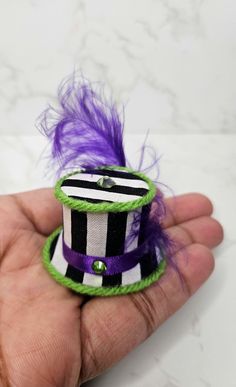 Beetlejuice Closed Bottom Tiny Top Hat Black White Stripe Green Purple w/Rhinestone and Side Feather Halloween Spooky Season Perfect for that upcoming convention! Excellent for parties and other special occasions! Wonderful for Stylish Pets or Dolls! Twinsies, anyone? Great to wear as an everyday accessory that is just as unique and interesting as you! **The look of each hat may slightly vary since they are handmade** These tiny top hats are no taller than 1 and a half inch and no wider than 2 i Beetlejuice Accessories, Beetlejuice Hat, Tiny Top Hat, Beatle Juice, Halloween Juice, Crazy Hat Day, Hat Day, Crazy Hats, Halloween Bash