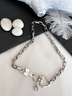 "Massive box chain Swarovski padlock necklace, luxurious antique silver heart push gate necklace, bold square chain locket crystal pendant Welcome to my shop! PLEASE KINDLY NOTE: THE LISTING IS FOR ONE NECKLACE!! Chunky box chain necklace made of a sturdy and thick stainless steel metal, and is completed with a padlock and key, a unique heart gate clasp, and an original Swarovski crystal! All silver pieces are subjected to an anti-allergic process (nickel and lead-free). MEASUREMENTS: I make thi Silver Chain Necklace With Lock, Silver Metal Necklace With Lock Detail, Gift White Gold Chunky Chain Necklace, Chunky Chain White Gold Necklace As Gift, White Gold Chunky Chain Necklace Gift, Everyday Silver Necklace With Lock Detail, Silver Heart-shaped Lock Jewelry, Silver Lock Necklace In Sterling Silver, Metal Chain Necklace With Lock For Gift