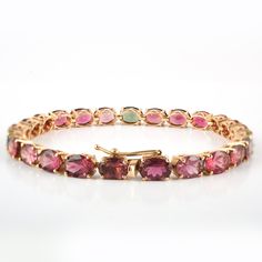 This is a classic style bracelet. A must-have statement piece for every woman. It's a classic luxury to have. A perfect gift for your loved ones. -Material - 18K Solid Gold -Gemstone - Genuine MultiColor Tourmaline -Gross weight - 14.00 Grams -Gemstone Weight - 18.870 Ct The bracelet length can be adjusted to your wrist size, on request. You can also go to my shop Home for more similar bracelets: https://www.etsy.com/in-en/shop/SilverAppeal We offer free resizing, and any customization is welcom Elegant Tourmaline Bracelets As Gift, Elegant Tourmaline Bracelets For Gift, Elegant Tourmaline Bracelet For Gift, Elegant Gold Tourmaline Bracelets, Elegant Pink Tourmaline Bracelets, Tsavorite Ring, Multi Gemstone Bracelet, 18k Gold Bracelet, Unusual Rings