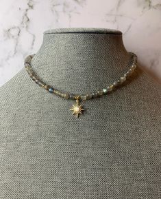 Welcome to my shop! 🦋 If you love handmade genuine crystal jewelry, you are at the right place!  This beautiful Labradorite Crystal Choker is a handmade piece with 6mm labradorite crystal beads, 2mm gold-plated spacer beads, a gold-filled star pendant and a 2-inch gold-filled extender.  This beautiful choker is approx. 14 inches in length with a 2-inch gold-filled extender.  Every piece is made to order and usually takes 5-7 business days for production and 1-2 business days to ship.   Every piece is unique due to each stone being slightly different. All beads are genuine crystals.  Each piece is handcrafted with love ♡︎  For best care, keep jewelry pieces dry at all times. All sales are final. No exchange or returns.    Any questions feel free to message me and I will respond ASAP! Handmade Traditional Jewelry, Crystal Labradorite, Pony Bead Bracelets, Handmade Chokers, Beautiful Chokers, Crystal Choker Necklace, Diy Bracelet Designs, Crystal Necklaces, Labradorite Crystal