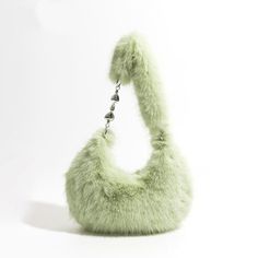 Discover Your New Favorite Accessory Step into a world of style and comfort with our Chic Fuzzy Faux Fur Half Moon Shoulder Bag. Designed for the modern woman who values both fashion and functionality, this trendy plush crossbody purse is a must-have addition to your accessory collection. Whether you're running errands, heading to a brunch, or enjoying a night out, this bag complements every occasion with its versatile design. Exceptional Features This shoulder bag showcases a unique half-moon s Trendy Shoulder Bag With Faux Fur Lining, Chic Winter Shoulder Bag With Zipper Closure, Trendy Fluffy Faux Fur Shoulder Bag, Chic Shoulder Bag With Faux Fur Lining, Trendy Faux Fur Shoulder Bag With Faux Fur Lining, Trendy Tote Shoulder Bag With Faux Fur Lining, Trendy Winter Shoulder Bag With Faux Fur Lining, Chic Faux Fur Fluffy Shoulder Bag, Chic Winter Faux Fur Shoulder Bag