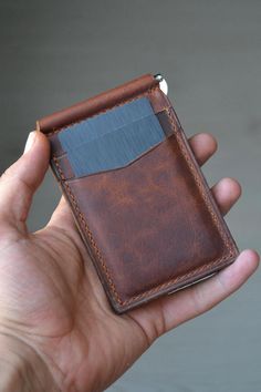 Handmade leather wallet with money clip | Bifold Slim Cardholder for Men | Personalized Wallet | Unique Gift We present to you a fully handcrafted genuine leather money clip wallet for men 😍. With the durability of handmade craftsmanship and genuine leather, this is the best gift for men. Its slim design and functional clip offer a solution to all your needs without taking up too much space. PERSONALIZATION *You can add up to 8 uppercase letters to the front of the wallet, or order it in the cl Wallet With Money, Leather Money Clip, Leather Money Clip Wallet, Personalized Leather Wallet, Leather Money Clips, Leather Cardholder, Handmade Leather Wallet, Personalized Wallet, Clip Wallet