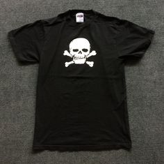 DESCRIPTION Vintage Skull Bone Rare 90s T shirt Condition : Good Condition Size on tag : M Measurement : Armpit to armpit 19.5"  length 29.5" Material : 100% Cotton SHIPPING Shipping duration is vary depending on location..all item is ship using EXPEDITED SHIPPING by DHL or FEDEX with tracking and usually will arrive within 3 - 5 working days PAYMENT We accept PayPal only. The item will be sent within 3 days after payment is completed. I am happy to offer a full refund including shipping and han 90s Shirts, Vintage Skull, Gifts For My Boyfriend, Mens T Shirts, Skull And Bones, Ladies Tops Fashion, Mens T, Unique Items Products, Mens Outfits