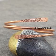 Copper Healing Bracelet , Copper Cuff Bangle , Copper Bangle Bracelet, Wrap Bangle , Adjustable Copper Bangle, Anniversary Copper Jewelry Metal - Pure Copper Style : Bangle Our Goal is 100% Customer Satisfaction :- -: All Products Description are 100% Exact:- XS (adult) - 14cm to 15.4cm ( 7 inch ) S (adult) - 15.5cm to 16.5cm (7.5 inch) M (adult) - 16.6cm to 17.5cm (8 inch) L (adult) - 17.6cm to 18.5cm (8.5 inch) XL (adult) - 18.6cm to 20cm (9 inch) XXL (9.5 inch) Benefits of Copper Bangle !! We Unique Adjustable Wrap Bangle Bracelet, Adjustable Wrap Bangle Bracelet, Adjustable Unique Wrap Bangle Bracelet, Handmade Adjustable Spiral Cuff Bracelet, Adjustable Bangle Wrap Bracelet Gift, Gift Double Band Cuff Bracelet, Adjustable Double Band Cuff Bracelet As Gift, Adjustable Hand Wrapped Bracelet, Unique Adjustable Jubilee Bracelet