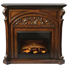 an ornate wooden fireplace with a fire place in the center and flames on either side