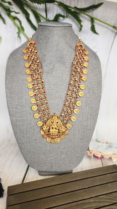 Add charm and charisma to your beautiful personality with these beautifully designed and handcrafted Brass necklaces. The antique finish gives this Necklace a very eye-catching look. Long necklace designed beautifully and compliments very well. Wear it with any of your party or casual outfits and grab compliments all the way! Length 26 to 28 inches! Elegant Gold Jewelry Sets With Oxidized Finish, Handmade Temple Jewelry For Rituals, Elegant Dual-tone Jewelry For Rituals, Meenakari Chandbali Metal Necklaces, Dual-tone Pendant Jewelry For Festivals, Festive Long Necklace For Gifts, Elegant Antique Gold Chandbali Necklaces, Antique Gold Kundan Jewelry For Celebration, Gold Long Necklace With Meenakari