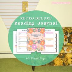 the retro deluxe reading journal is on display in front of a green circle with flowers