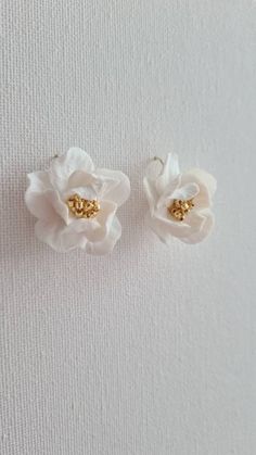 Elliane's floral earrings are made of lightweight yet durable white polymer clay. Each flower is carefully hand-sculpted and the centres are finished with Japanese Toho golden, silver or white beads, suspended on gold-filled or sterling silver hook earrings. Beautiful lightweight design and is easy to wear. Perfect for your garden-inspired wedding. Sent beautifully packaged in a Medze Bride gift box. As Élliane earrings are made to order especially for you as well due to hygienic reasons I canno Delicate White Jewelry With 3d Flowers, Handmade White Flower Drop Earrings, White Handmade Flower Drop Earrings, Handmade White Flower Earrings For Anniversary, White Handmade Flower Earrings For Anniversary, Gold Jewelry With 3d Flowers In Polymer Clay, Gold Polymer Clay Jewelry With 3d Flowers, White Flower Earrings With Ear Wire For Anniversary, Gold Flower-shaped Polymer Clay Earrings