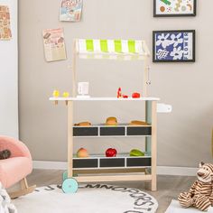 a child's play room with toys on the floor