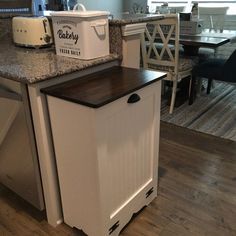 a kitchen island with a microwave and toaster on it