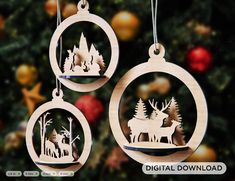 three wooden ornaments hanging from a christmas tree